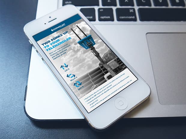 Conquip website on a mobile phone resting on a laptop