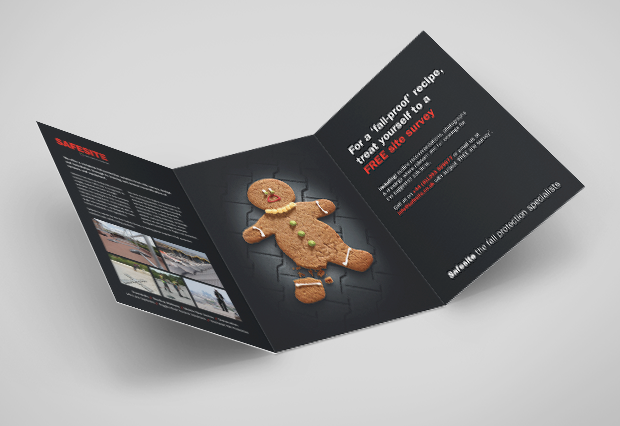 Front oInside of a folder with an image of a broken gingerbread man